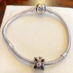 Silver Pandora charm with pink gemstone